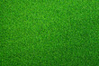 © Mariia - Artificial grass, covering. Artificial green grass mat, top view. Texture. Background. Artificial turf, surface made of synthetic fibers. Flat green grass texture background. Short grass