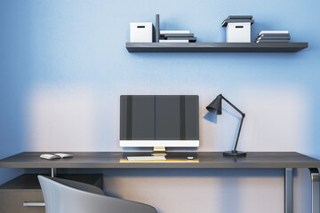 Poster - Modern blue home office interior with computer monitor and other objects on desk. 3D Rendering.