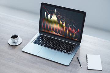 Canvas Print - Close up of laptop on wooden desk with coffee cup, supplies and downward forex chart on white wall background. Financial recession and crashing market concept. 3D Rendering.