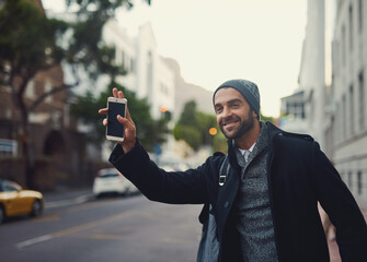 Canvas Print - Phone, city and man calling taxi in street for journey, travel or public transportation. Cellphone, town and male author waving for cab service in road to commute to publishing office in New York.