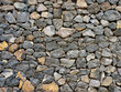 © Su Nitram - Background of stone wall texture. Old texture of granite stone wall surface.