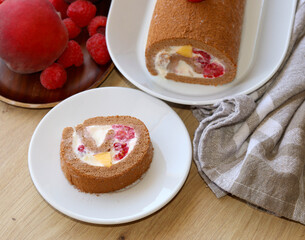 Wall Mural - Homemade, peach and raspberry chocolate roll.