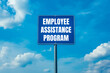 © Emre Akkoyun - Employee assistance program message written on blue road sign with cloudy sky background. Conceptual employee assistance program symbol. Copy space.