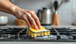 © Stock - Close-up hands of people using sponge cleaning stove in the kinchen isolated with white highlights, png