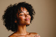 © MagnusCort - A close up of a black woman's face with her eyes closed