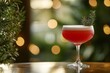 © Mark - Bokeh of festive holiday celebration featuring strawberry margaritas at the bar stand. Luxury vacation concept. Vertical.