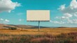 © pinporn manosri - Billboard in a rural area, standing alone against a backdrop of open fields and distant hills.