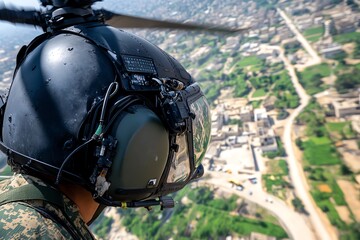 Helicopter pilot looking over a sprawling urban and rural landscape from above, capturing the scenery during flight.