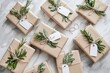 © netrun78 - Elegant gift wrapping with natural elements and tags arranged on a light marble surface