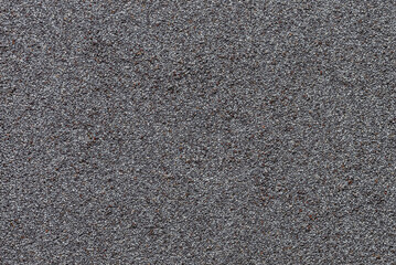 Poppy seeds background. Abstract texture from poppy seeds.