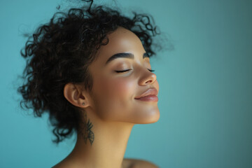 A close up of a woman's face with tattoos and her eyes closed