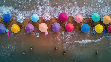 Wall Mural -   Group of people on a sandy beach with umbrellas