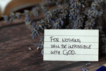 Wall Mural - Inspirational handwritten note: Nothing will be impossible with God. Close-up. Christian biblical concept of Jesus Christ's authority, power and glory.