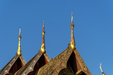 detail of the sculptures on the roof of Wat Chiang Man, Chiang Mai, Thailand