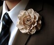 © Qstock - Elegant Beige Flower Boutonniere on a Suit for Formal Events and Weddings