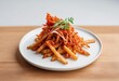 © Anarkali Art - Fries Topped with Vibrant Red Sauce and Fresh Cilantro Leaves