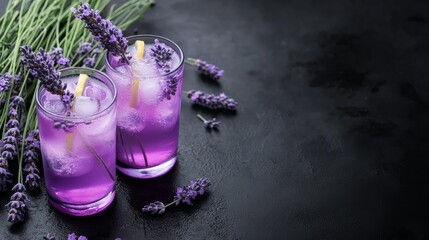 Wall Mural - A bouquet of lavender flowers, two lavender lemonades, and a copy space black table