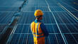 © EEKONG - Engineer Inspecting Solar Panels with Copy Space for Text/Graphics, Renewable Energy Technology Concept