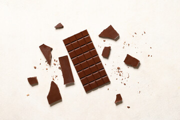 Wall Mural - Sweet chocolate bar on white background