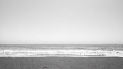 Canvas Print -  Monochromatic image of a coastline with a surfboard in the foreground and the sea in the background