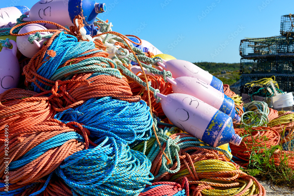 Bundles of commercial nylon woven fishing line orange, yellow, blue ...