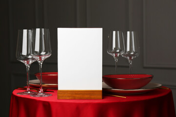 Sticker - Menu holder, clean dishware and cutlery on red table in restaurant