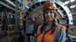 © Youttakone - Portrait of a heavy equipment female engineer from a huge industry who came to inspect the metal sheet factory's machinery.