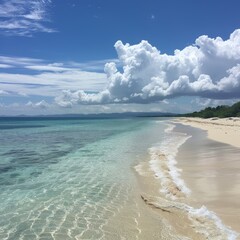 Wall Mural - Tranquil beach with clear turquoise water and white sand, under a bright blue sky with fluffy clouds.