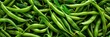 © TheWaterMeloonProjec - Vibrant and crisp fresh green beans from a top view, offering a burst of garden freshness in each bite.
