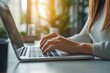 © Visual Odyssey - Close up of business woman hands typing on laptop computer, searching and surfing the internet on office desk, online working, telecommuting, freelancer at work, Generative AI