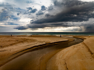 Poster - Landscape of dark rain clouds over ocean,stormy dark clouds over sand beach in Phuket island Thailand