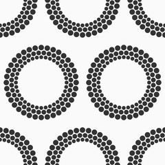 Wall Mural - Abstract geometric seamless vector pattern with dotted circles. Rings of points seamless pattern. Minimalistic design. Vector black and white seamless background.