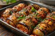 © Boinah - A delicious dish of stuffed vegetables baked in a flavorful sauce.