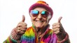 © indyntk - Senior citizen in vibrant LGBTQ+ clothing giving thumbs up with a happy expression on isolated white background reflecting joy