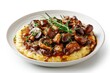 © Boinah - A plate of creamy polenta topped with saut?ed mushrooms and herbs in a savory sauce.