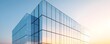 © JP STUDIO LAB - A sleek modern building with reflective glass windows under a colorful sky at sunset, showcasing contemporary architecture.