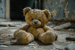 © sandor - A toy bear abandoned on a dusty floor. Concept of sadness, abandonment, loneliness.