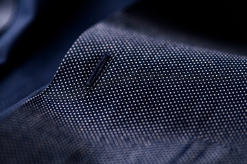 Close up of dark Men's shirt. Soft focus. Copy space.	