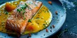 © AkuAku - Salmon Fillet with Passion Fruit Sauce on a Bed of Pumpkin