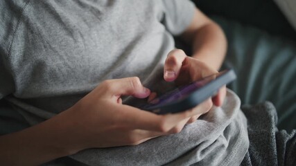 Poster - close up of caucasian teenager typing and chatting with friends in messaging app using mobile phone,
