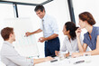 © STEEXBuyout/peopleimages.com - Mature businessman, graphs and teaching in presentation with staff for financial analysis and sales results. People, CEO and team in training for coaching, planning or accounting management advice