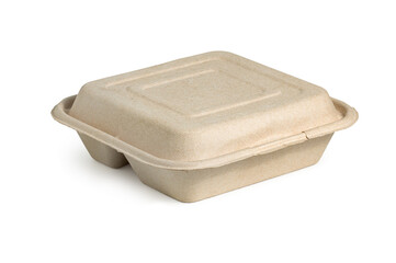 Food containers made of molded pulp or similar biodegradable material. It has a tan or light brown color and a rectangular shape with raised edges to hold food items, isolated on a white background.