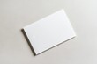 © D.e.a.r - blank white card onsoft beige background, evokingsense of simplicity and calm. Ideal for creative projects or personal notes.