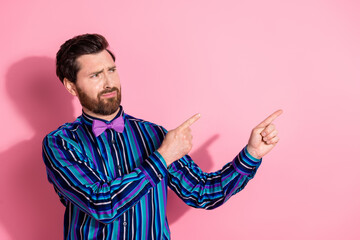 Sticker - Portrait of nice classy young man point fingers empty space wear shirt isolated on pink color background