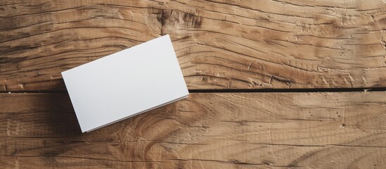 Fototapete - Wooden background with a blank business card Stylish branding mock up on a designer s desk with space for text in the image. Creative banner. Copyspace image