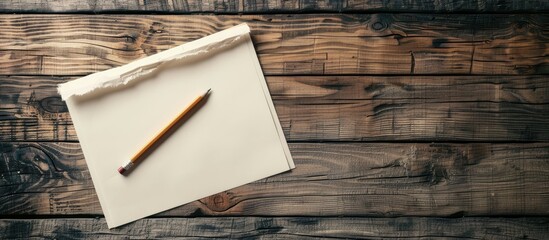 Poster - Vintage wooden desk workspace with blank A4 paper and pencil on textured background ideal as a copy space image for creative projects and business planning