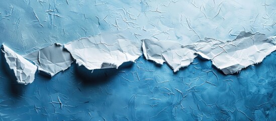 Aufkleber - Torn paper against a blue backdrop with copy space image