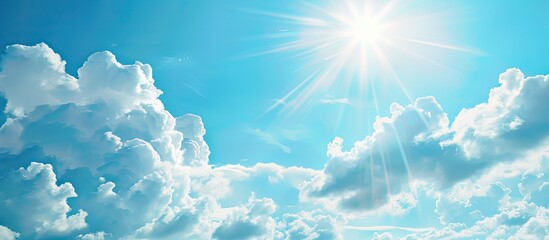 Aufkleber - Sunny day with a blue sky adorned by fluffy white clouds ideal for a design background Perfect for wallpapers or web banners featuring a copy space image