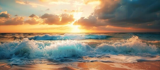Poster - Scenic seascape at dusk with waves crashing under a beautiful cloudy sky Ideal for travel and tourism themes with a nature inspired copy space image for wallpaper design