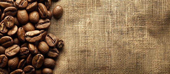 Canvas Print - Linen fabric backdrop with roasted coffee beans as a focus perfect for copy space image